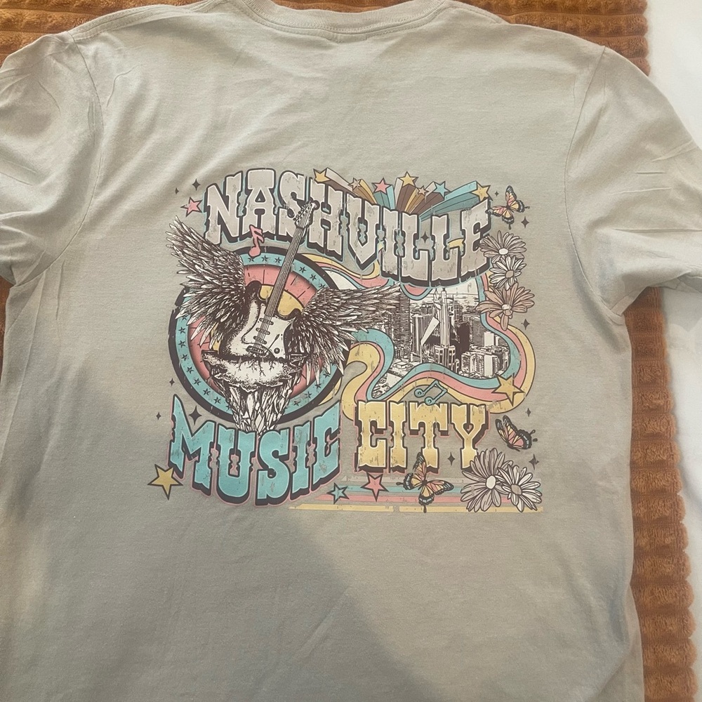 Short-sleeve t-shirt. Size Small. Bought from boutique.
